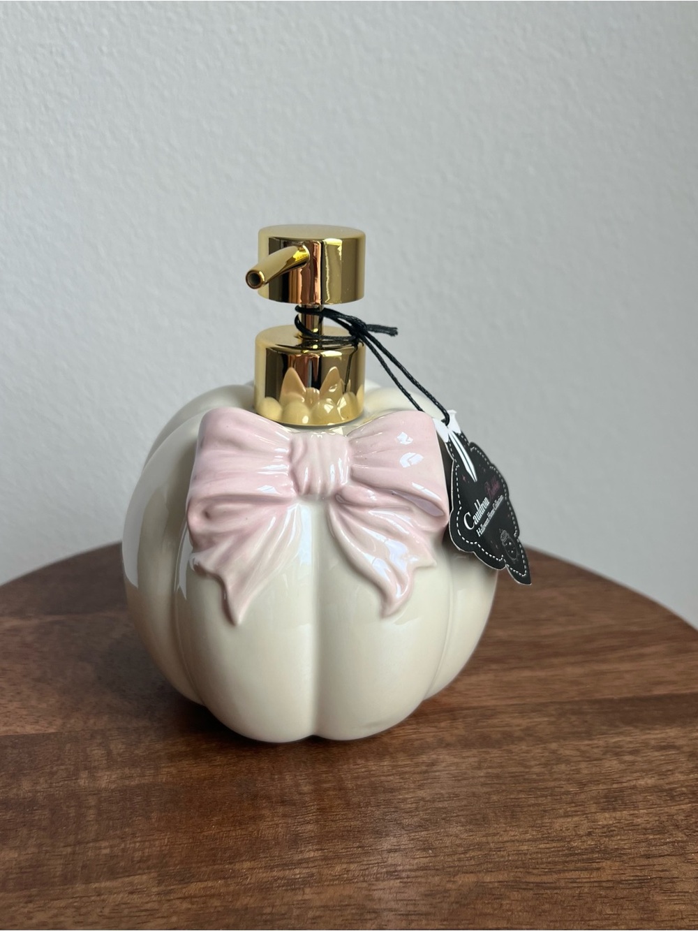 New White Ceramic Pumpkin With Pink Bow Soap Dispenser